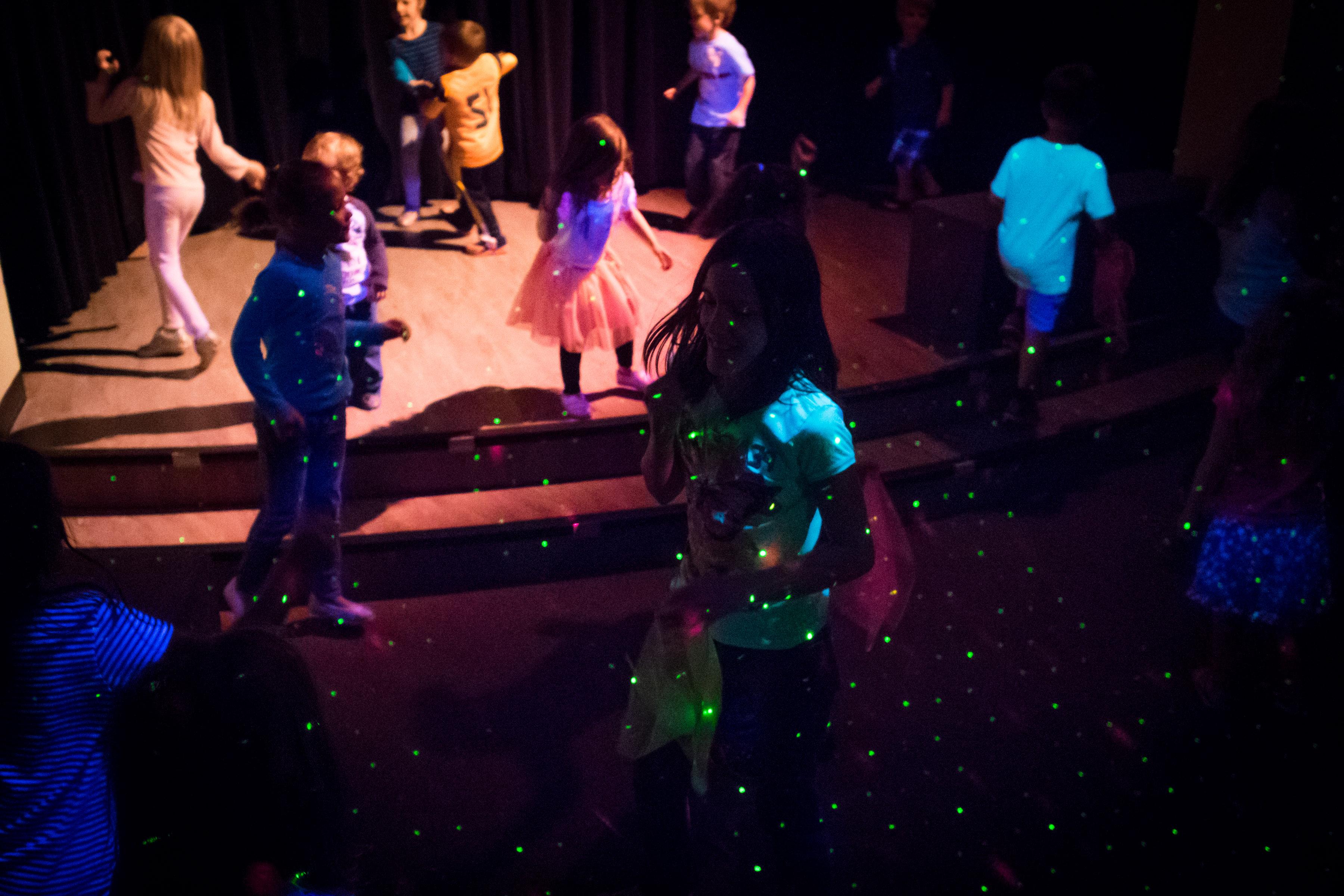 image of children participating in a dance party